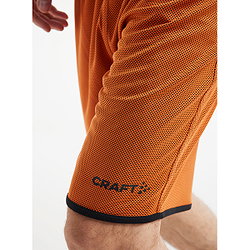 Présentation: Craft Progress Short Réversible Hommes - Orange / Noir