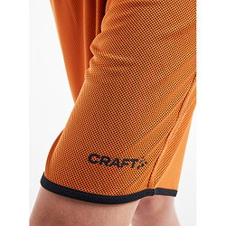 Présentation: Craft Progress Short Réversible Femmes - Orange / Noir