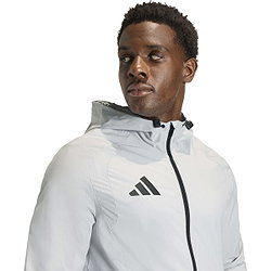 Présentation: Adidas Tiro Travel Coupe-Vent Hommes - Gris Clair