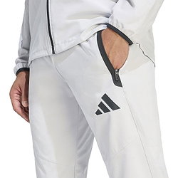 Présentation: Adidas Tiro Travel Woven Pantalon D'entraînement Hommes - Gris Clair